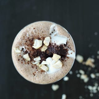 CrazyVeganKitchen.com | Delicious creamy Vegan Iced Mocha made with homemade cashew milk, coconut whipped cream, and a decadent dash of Kahlua. Simply satisfying! #vegan #icedmocha #mocha #coffee #caffeine #coconut #whippedcream #kahlua #veganfood #veganrecipe #recipe #drink