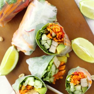 Easy recipe for vegan rice paper rolls with hoisin peanut dipping sauce. Filled with avocado, carrots, cucumbers, chilies, and other healthy ingredients. #ricepaperrolls #rolls #ricepaper #vegan #healthy #vietnamese #recipe #veganrecipe #veganfood