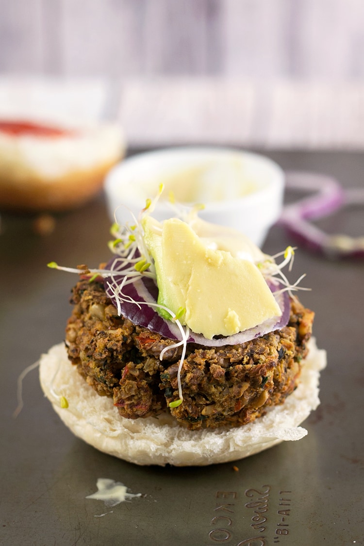 Maple Dijon Tofu Burgers - a healthy veggie burger made with Tofu and Walnuts, served with a Maple Dijon Mayonnaise. #healthy #tofu #burger #veggieburger #glutenfree #vegan #foodporn #delicious 