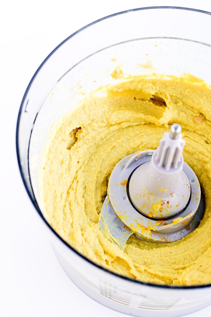 Vegan Deviled Potato Bites - A vegan version of Deviled Eggs. Homemade Hummus piped into Roasted Potatoes. #vegan #healthy #glutenfree #deviledeggs #simple #cheap