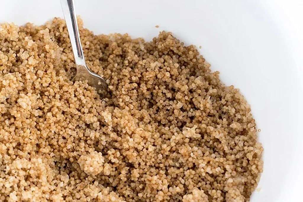 cooked quinoa in bowl.