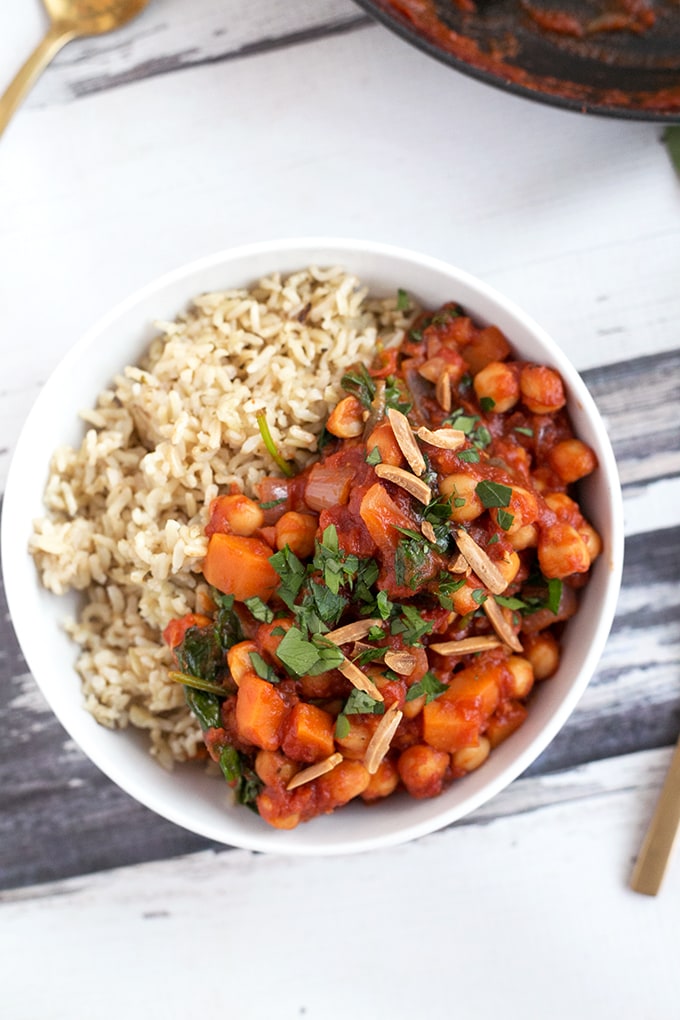 Vegan Spanish Chickpea And Sweet Potato Stew - healthy, hearty, and made in under 45 minutes. #vegan #recipes #veganfood #healthy #delicious #chickpeas #spinach #stew 