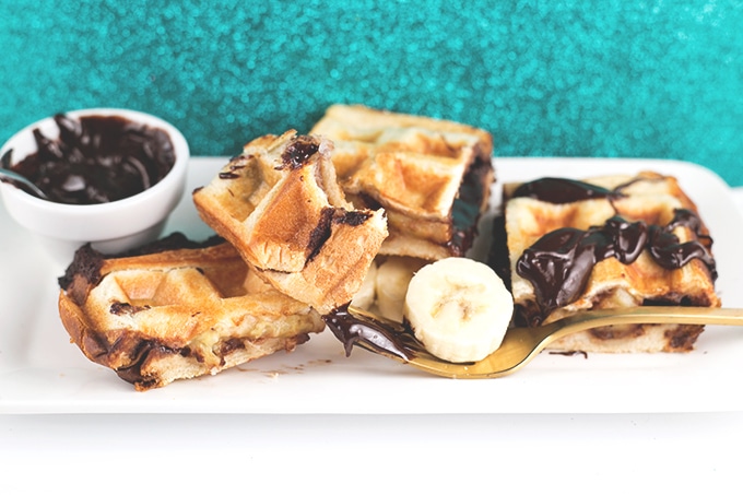 Vegan Waffled Nutella Banana Sandwich - Homemade Vegan Nutella, Banana and Bread pressed in a waffle iron. Simple, Easy, So Sinful. #vegan #nutella #waffled #sandwich #banana #vegetarian #dessert #breakfast