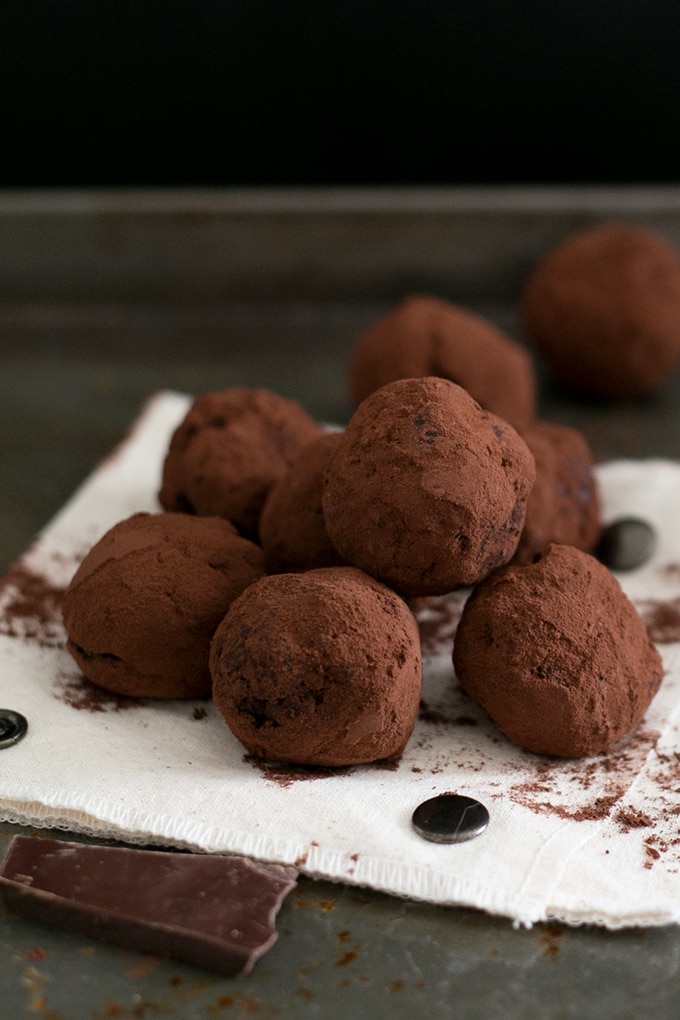 Simple Vegan Chocolate Truffles made with Dark Chocolate, Coconut Cream, Maple Syrup Sea Salt, Espresso and Vanilla Bean. Easy to make, decadent, yum. #CHOCOLATE #vegan #delicious #truffles #simple #dairyfree #easy #coconut #darkchocolate #recipes