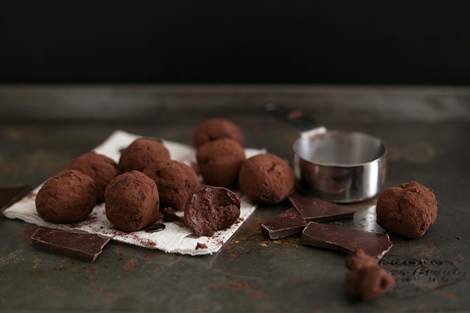 Simple Vegan Chocolate Truffles made with Dark Chocolate, Coconut Cream, Maple Syrup Sea Salt, Espresso and Vanilla Bean. Easy to make, decadent, yum. #CHOCOLATE #vegan #delicious #truffles #simple #dairyfree #easy #coconut #darkchocolate #recipes