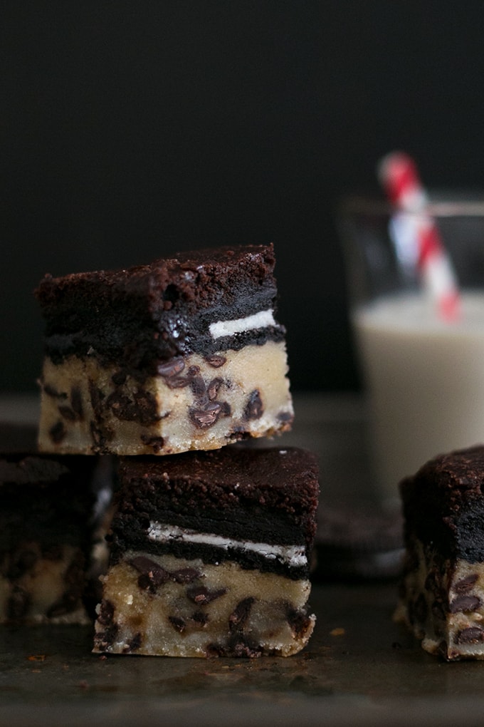 Vegan Slutty Brownies - Chocolate Chip Cookie Base stuffed with a Vegan Sandwich Cookies and topped with Vegan Brownie Batter. Simple, Decadent, Slutty! #chocolate #brownies #vegan #cookies #oreo #dessert #simple