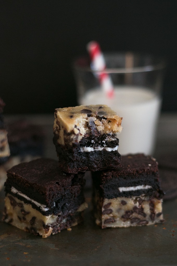 Vegan Slutty Brownies - Chocolate Chip Cookie Base stuffed with a Vegan Sandwich Cookies and topped with Vegan Brownie Batter. Simple, Decadent, Slutty! #chocolate #brownies #vegan #cookies #oreo #dessert #simple