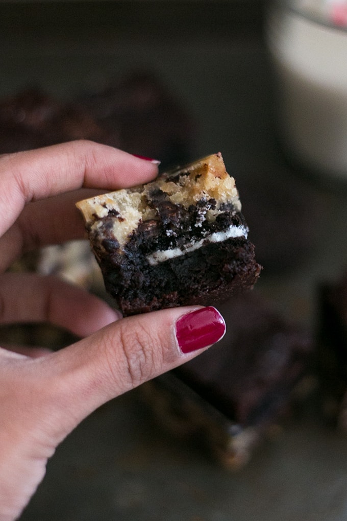 Vegan Slutty Brownies - Chocolate Chip Cookie Base stuffed with a Vegan Sandwich Cookies and topped with Vegan Brownie Batter. Simple, Decadent, Slutty! #chocolate #brownies #vegan #cookies #oreo #dessert #simple