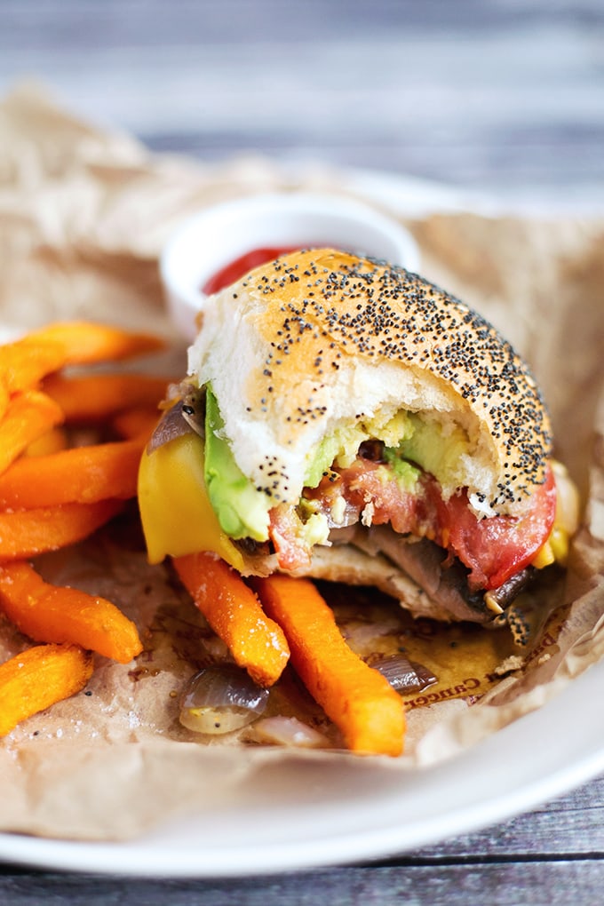 Simple Vegan Portobello Mushroom Burgers with Sweet Onions, Avocado, Tomato and Vegan Cheese. Inexpensive, Simple To Make And Full Of Flavor. #vegan #mushroom #burgers #veganburger #simple #portobellomushroom #recipes 