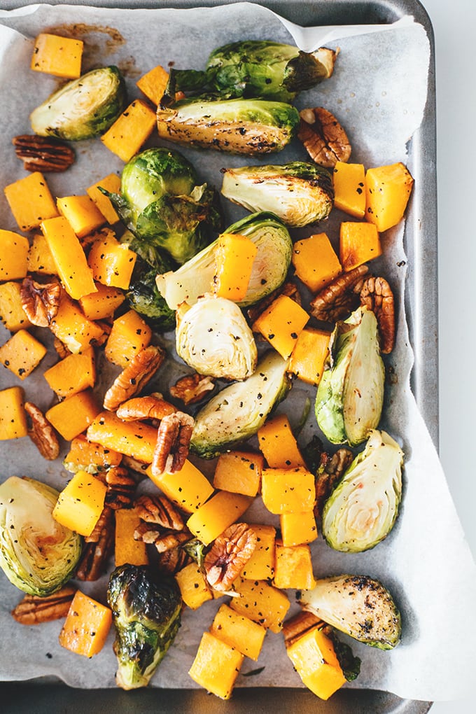 Maple Roasted Brussels Sprouts And Butternut Squash - healthy and delicious holiday side dish. Vegan, Gluten Free, Low in Fat, Easy To Make. #vegan #vegetarian #christmas #maple #brusselssprouts #butternut #squash #veggies #easy #recipe #delicious