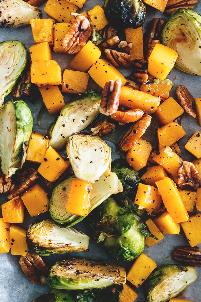 Maple Roasted Brussels Sprouts And Butternut Squash - healthy and delicious holiday side dish. Vegan, Gluten Free, Low in Fat, Easy To Make. #vegan #vegetarian #christmas #maple #brusselssprouts #butternut #squash #veggies #easy #recipe #delicious