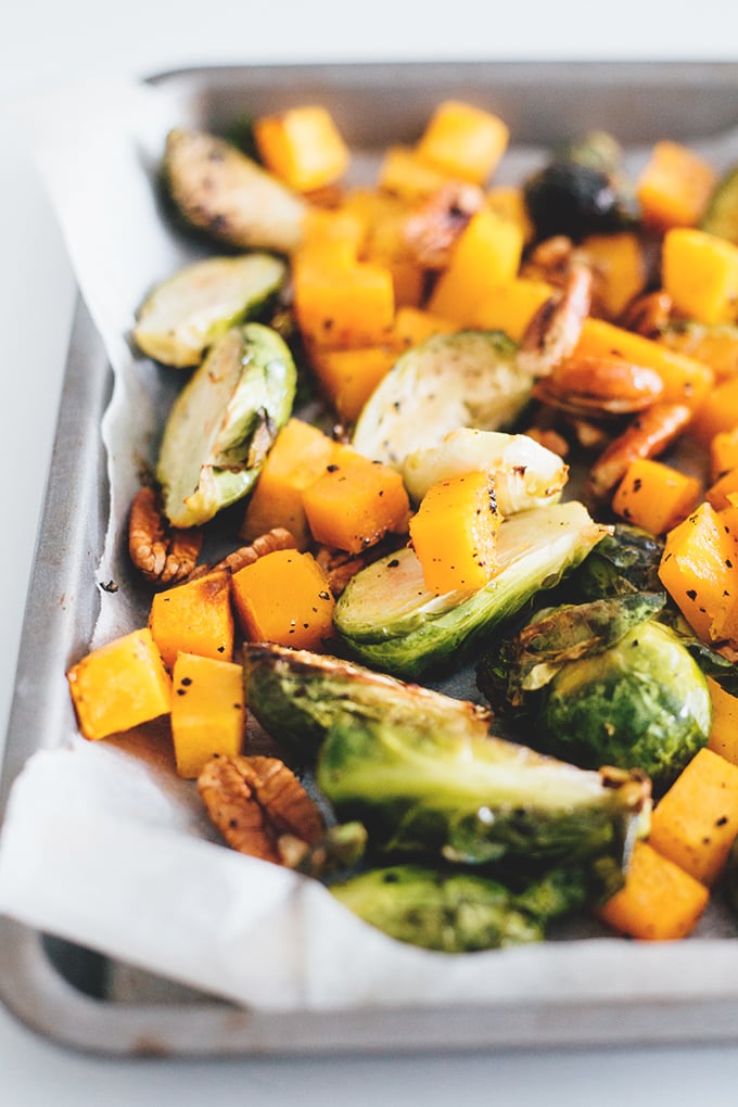 Maple Roasted Brussels Sprouts And Butternut Squash - healthy and delicious holiday side dish. Vegan, Gluten Free, Low in Fat, Easy To Make. #vegan #vegetarian #christmas #maple #brusselssprouts #butternut #squash #veggies #easy #recipe #delicious