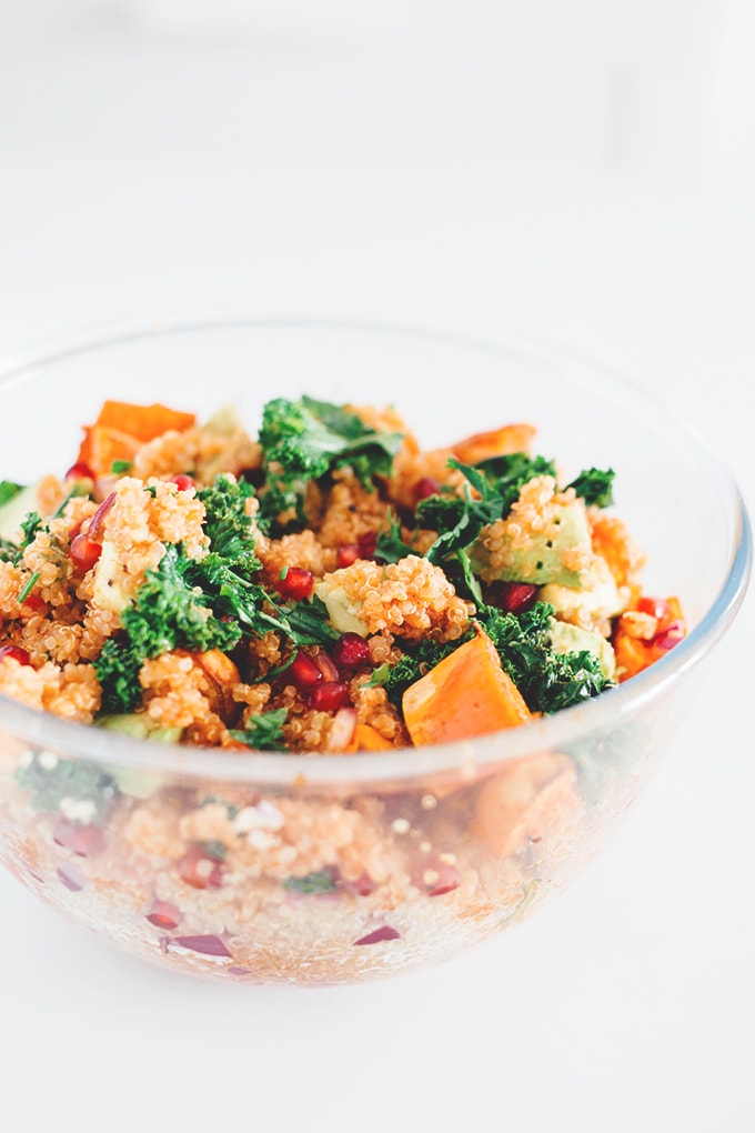 Delicious Detox Vegan Quinoa Salad with Kale and Pomegranate - A great detox recipe after the holiday season. Loaded with Sweet Potato, Kale, Tomato, Pomegranate, Red Onion and and an Orange Paprika Dressing. #vegetarian #healthy #detox #vegan #salad #quinoa