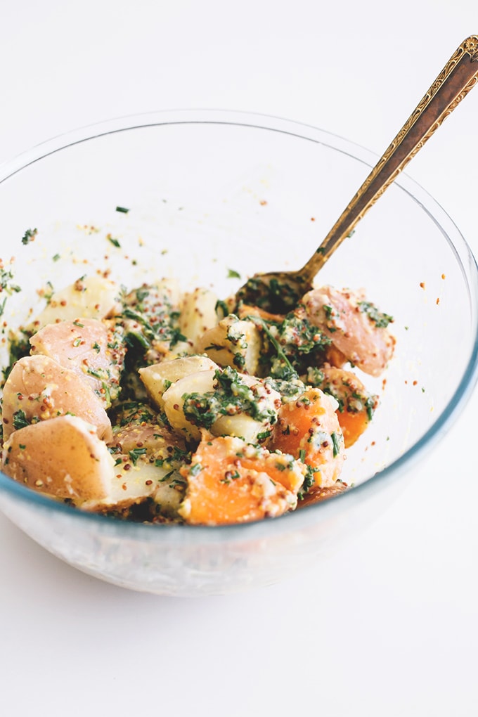 Healthy Vegan Herbed Potato Salad - a delicious salad loaded with Potatoes, Sweet Potatoes and a tangy Mustard and Herb Dressing. #vegan #healthy #delicious #potatosalad #herbs #simple #quick #veganrecipes