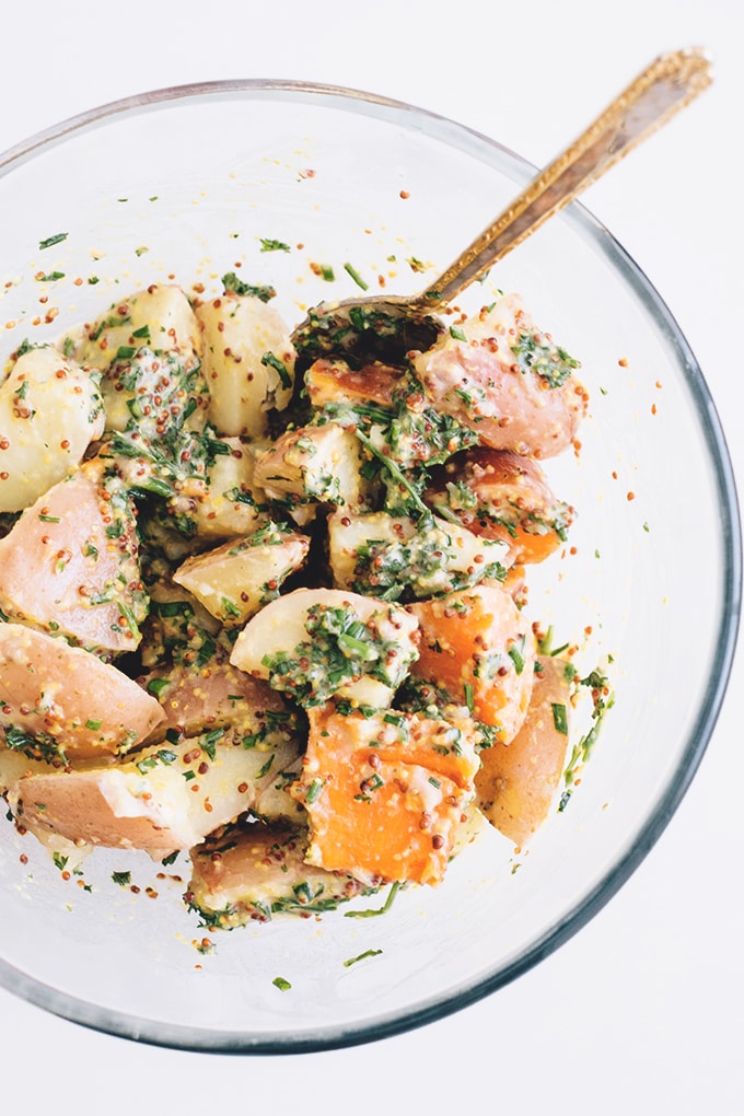 Healthy Vegan Herbed Potato Salad - a delicious salad loaded with Potatoes, Sweet Potatoes and a tangy Mustard and Herb Dressing. #vegan #healthy #delicious #potatosalad #herbs #simple #quick #veganrecipes