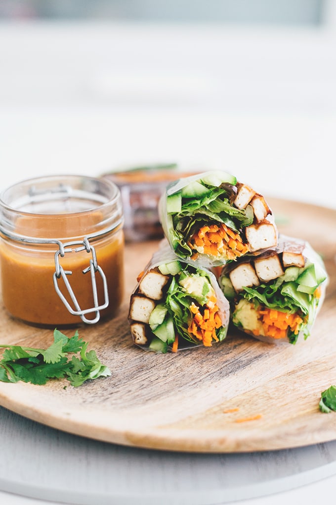 Vegan Teriyaki Tofu Summer Rolls - a healthy, light and low carb Asian inspired dish. Rice Paper Rolls with Teriyaki Baked Tofu, Fresh Veggies and a Spicy Peanut Dipping Sauce. #vegan #teriyaki #tofu #springrolls #summer #rolls #healthy #lowcarb #delicious