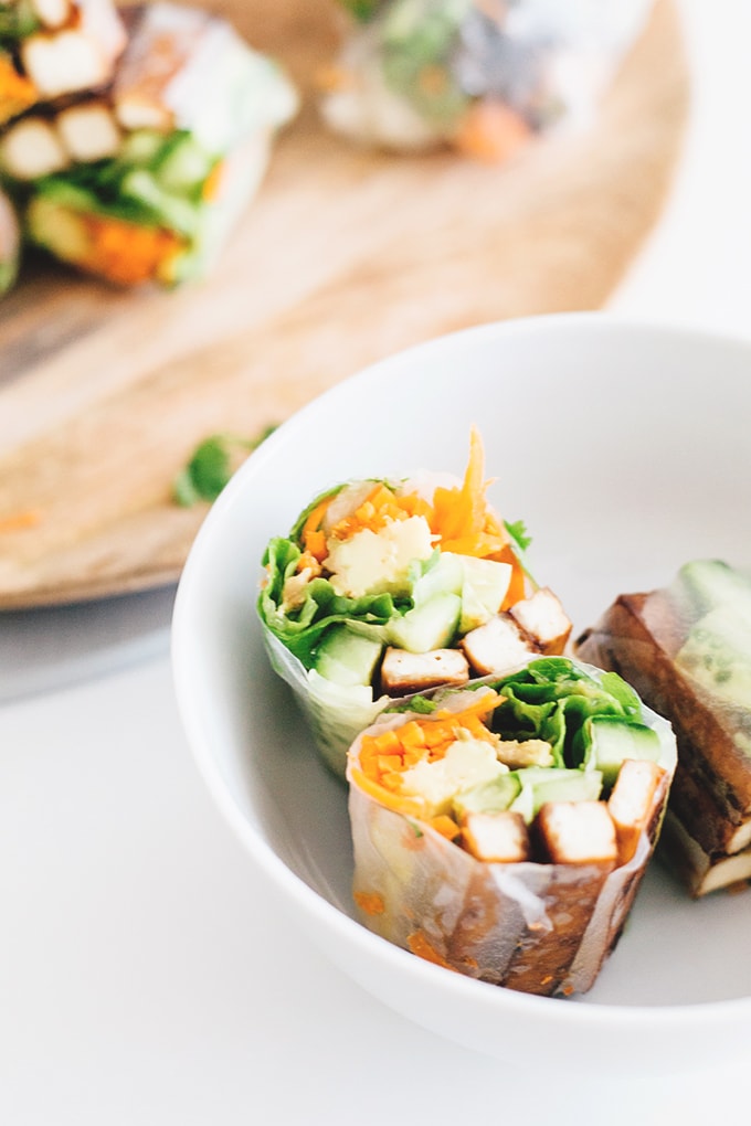 Vegan Teriyaki Tofu Summer Rolls - a healthy, light and low carb Asian inspired dish. Rice Paper Rolls with Teriyaki Baked Tofu, Fresh Veggies and a Spicy Peanut Dipping Sauce. #vegan #teriyaki #tofu #springrolls #summer #rolls #healthy #lowcarb #delicious