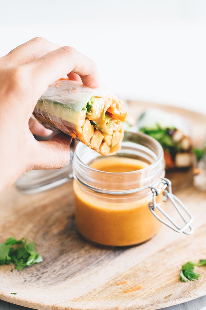 Vegan Teriyaki Tofu Summer Rolls - a healthy, light and low carb Asian inspired dish. Rice Paper Rolls with Teriyaki Baked Tofu, Fresh Veggies and a Spicy Peanut Dipping Sauce. #vegan #teriyaki #tofu #springrolls #summer #rolls #healthy #lowcarb #delicious