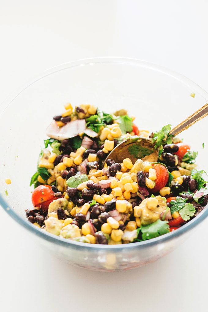 A healthy and delicious Vegan Black Bean Salad with Corn and Avocado In A Tangy Lime Dressing - No-Cook, Full Of Heart Healthy Fat and Loaded With Flavor! #vegan #blackbean #salad #healthy #recipes #vegetarian #corn #delicious
