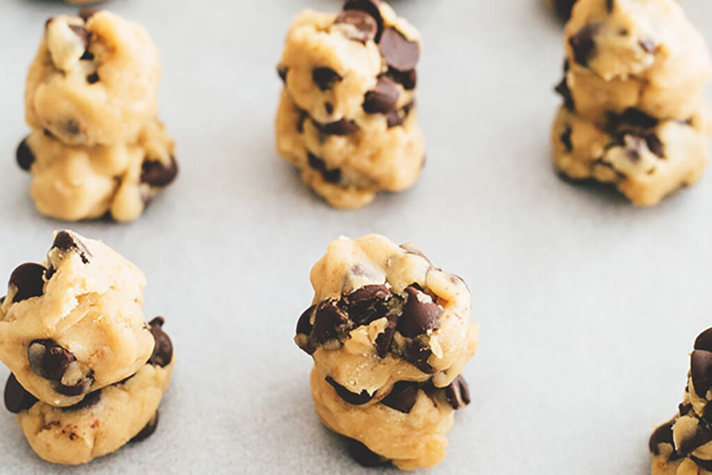 cookie dough balls on tray.