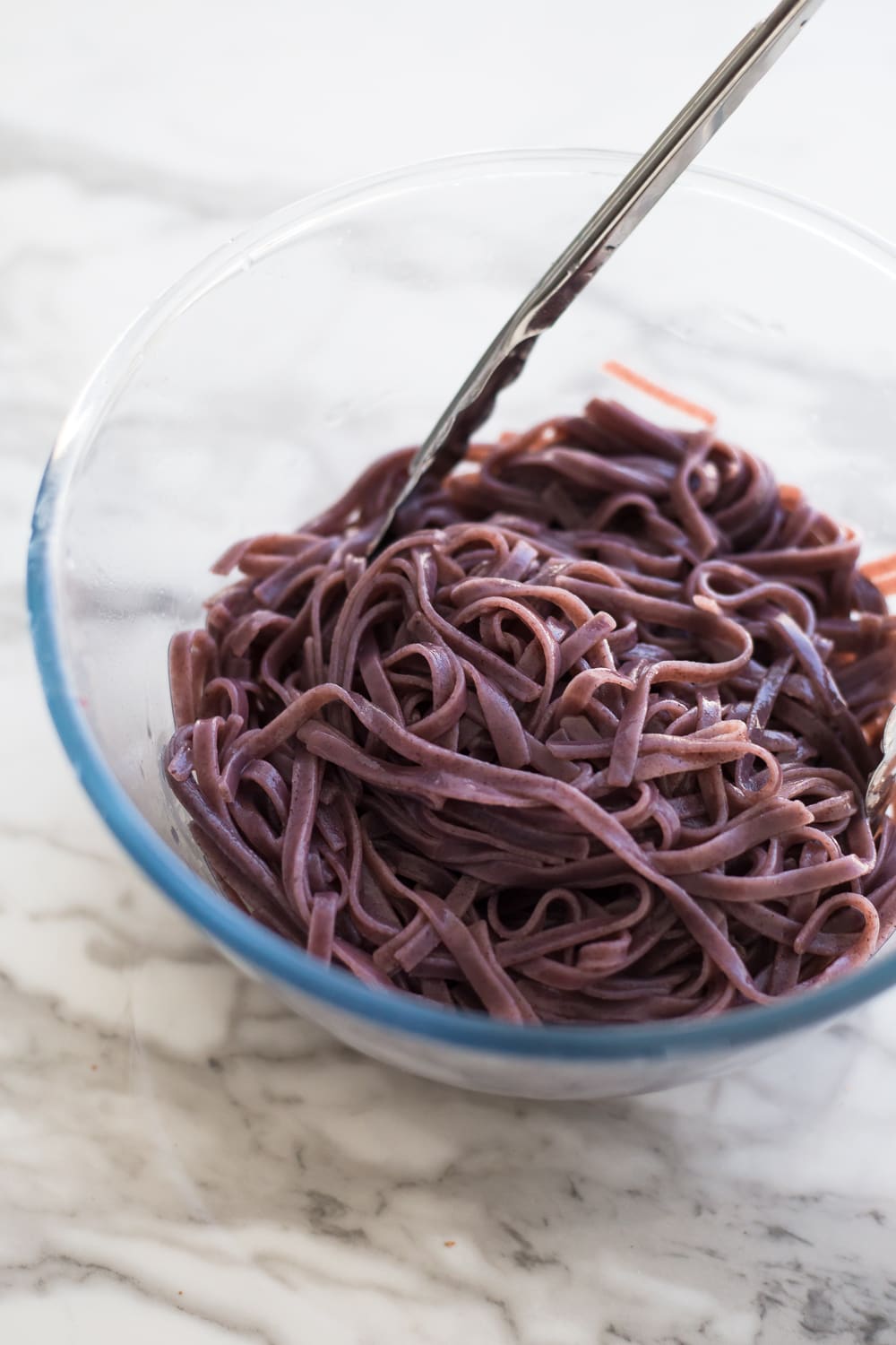 Healthy Vegan Korean Japchae Noodles - A Simple Dish loaded with Vegetables and Zucchini Noodles that is ready in under 30 minutes. #vegan #japchae #korean #noodles #recipe #asian #quick