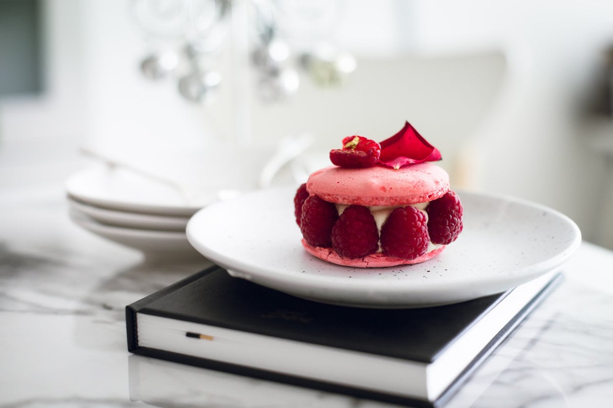 The Vegan Ispahan, made with Italian Meringue Vegan Macarons. Rose Shell, White Chocolate Rose Cream, Lychees and Raspberries. Gluten Free. #glutenfree #veganmacaron #ispahan #vegan #macarons #aquafaba #lychee #rose #raspberry