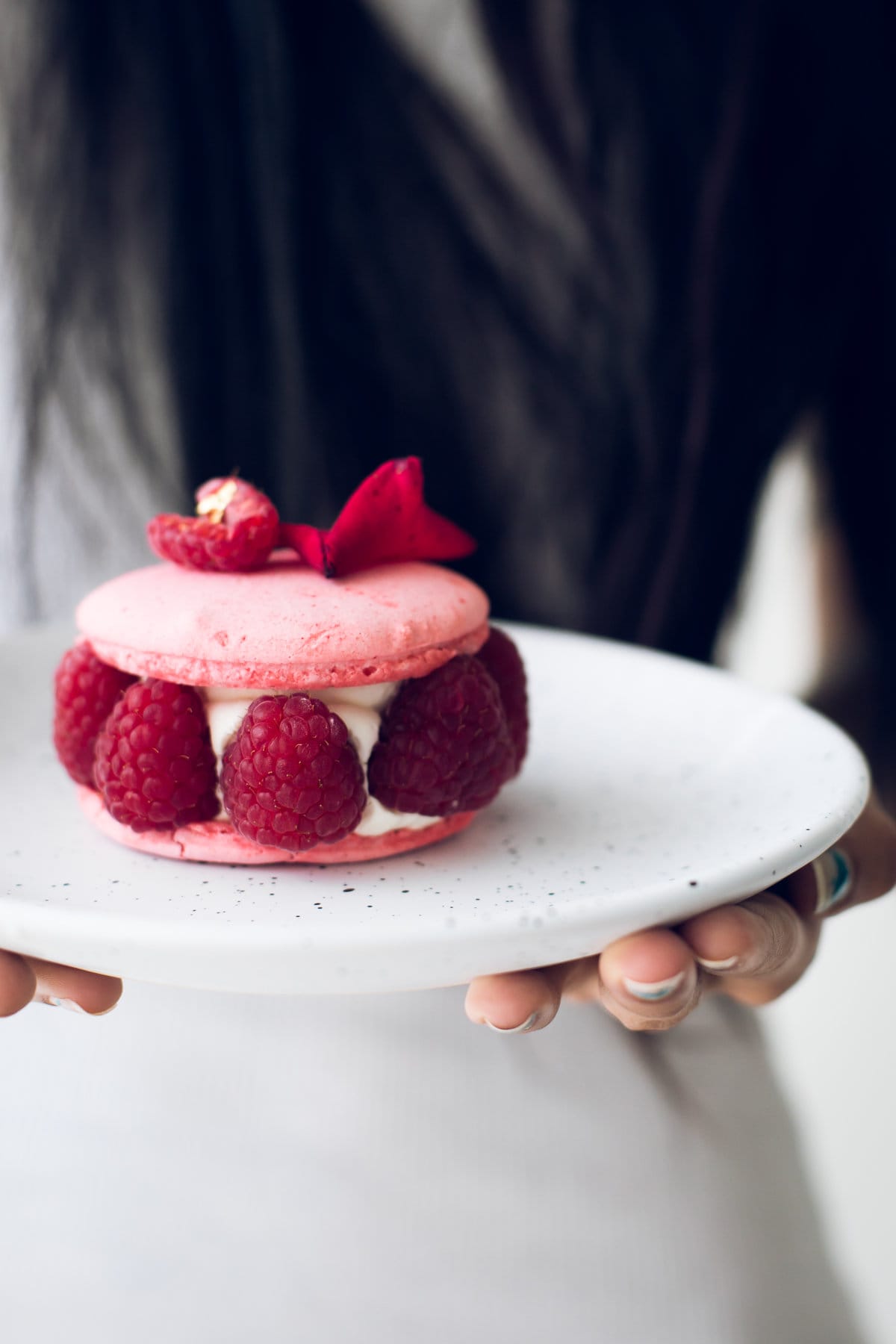 The Vegan Ispahan, made with Italian Meringue Vegan Macarons. Rose Shell, White Chocolate Rose Cream, Lychees and Raspberries. Gluten Free. #glutenfree #veganmacaron #ispahan #vegan #macarons #aquafaba #lychee #rose #raspberry