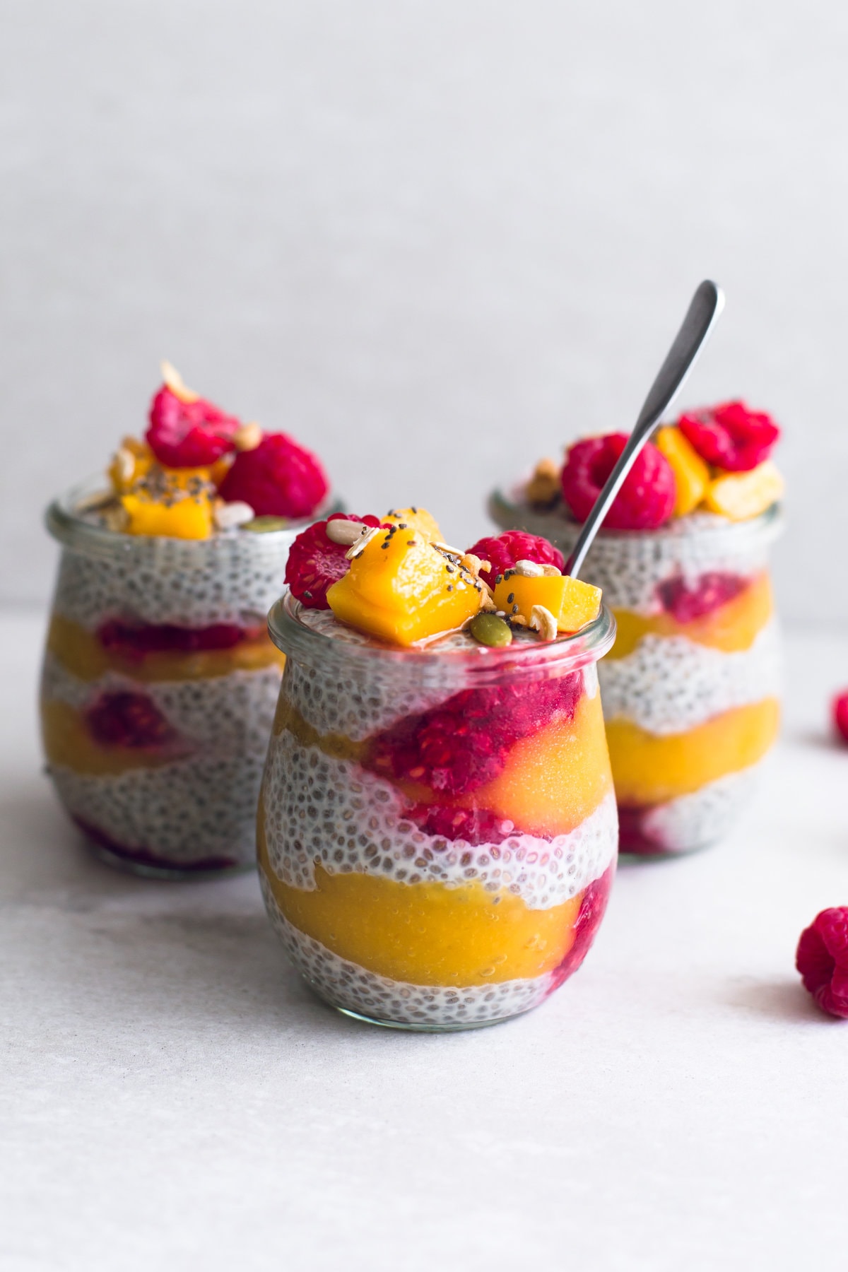 A healthy, fruity and delicious guilt-free Mango Raspberry Chia Seed Pudding. 100% Vegan, Gluten Free and Refined Sugar Free. #mango #raspberry #chia #pudding #refinedsugar #fruit #simple #healthy #breakfast #veganrecipes