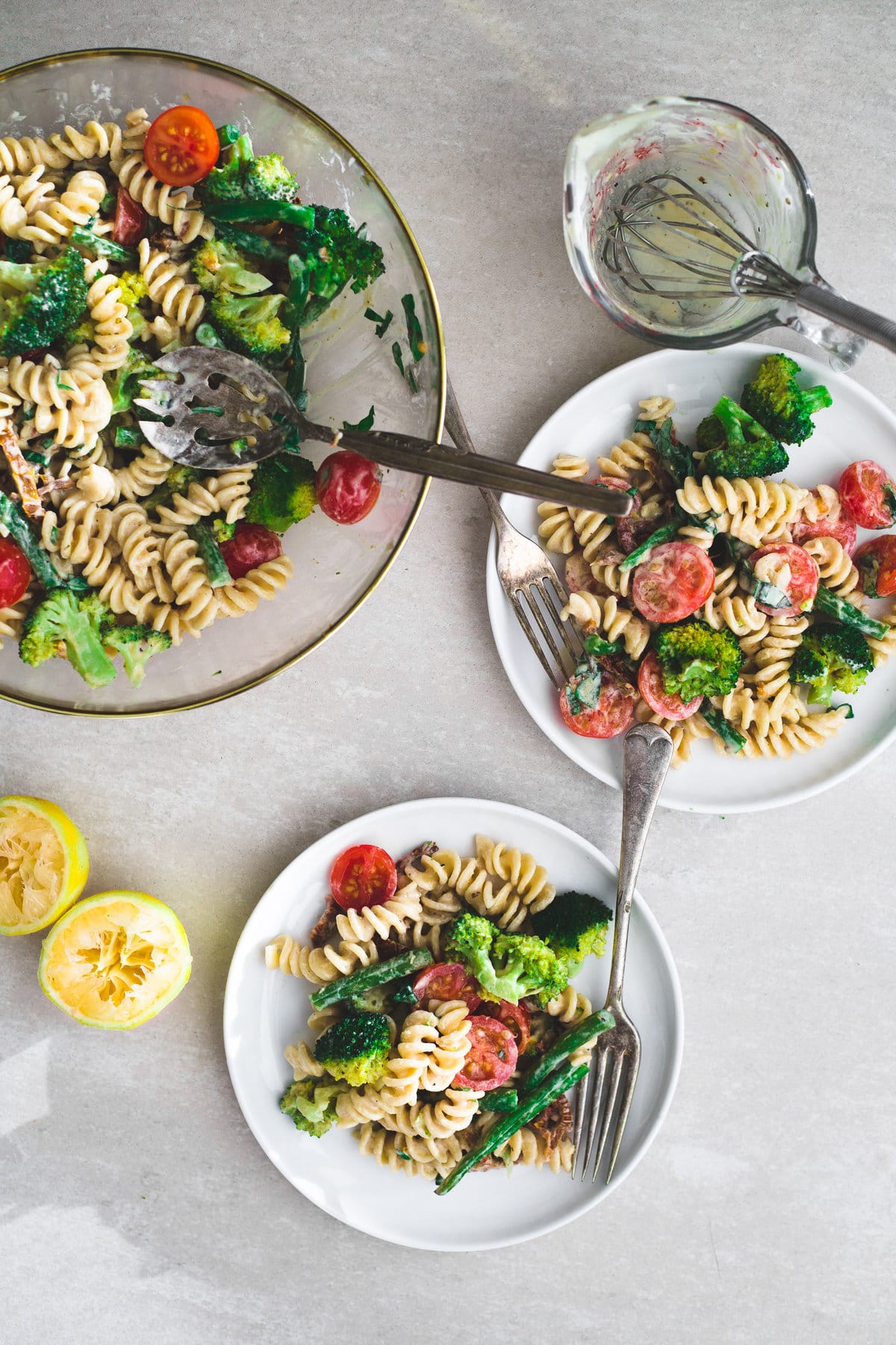 A delicious Vegan Lemon Tahini Pasta Salad loaded with Fresh Veggies and dressed with a delicious Tahini Lemon Dressing. Ready In Under 20 Minutes. #vegan #broccoli #pasta #pastasalad #lemon #tahini #simple #plantbased #dairyfree #noegg #healthy #greenbeans #simple 