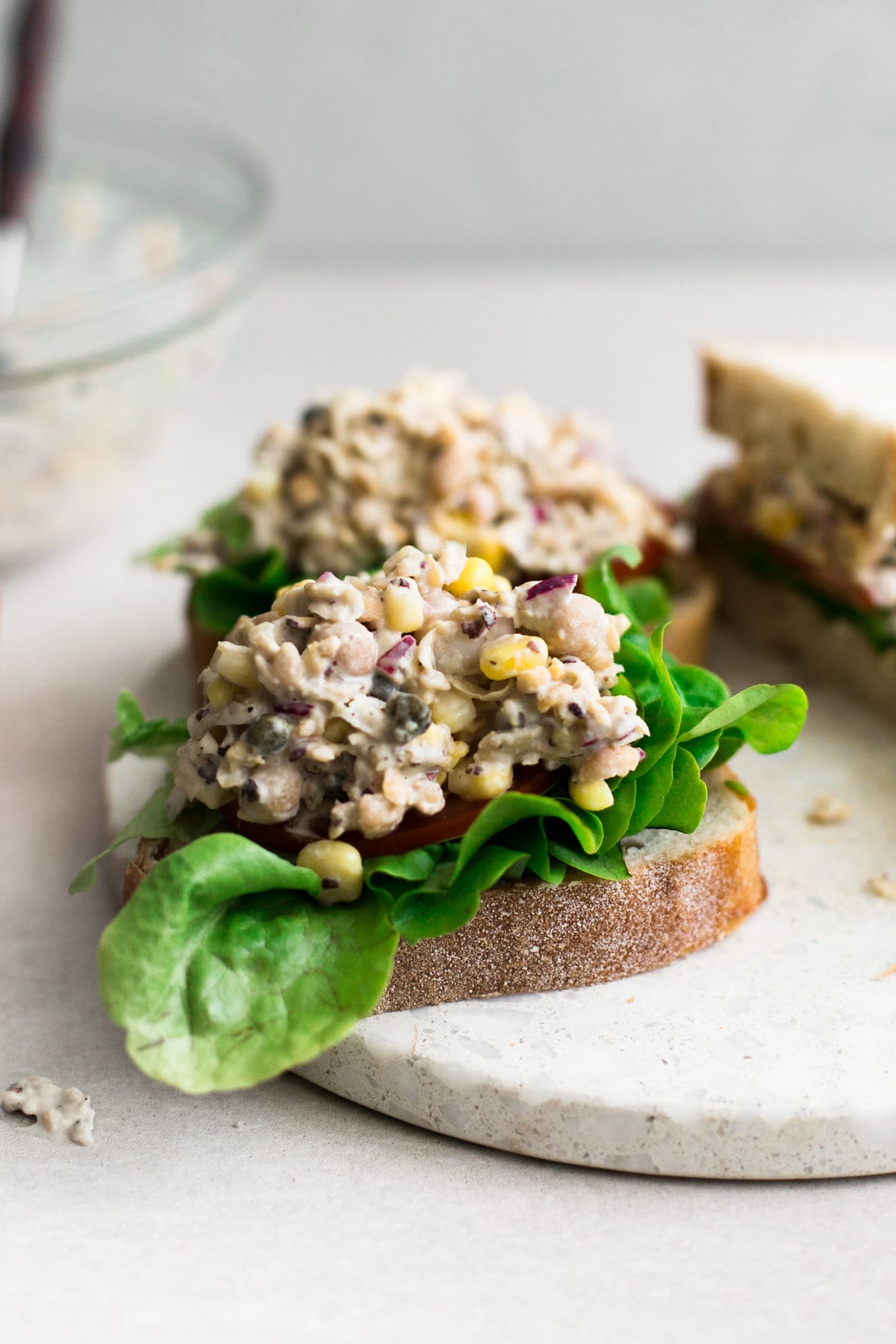 The Best Vegan Tuna Salad ever! Made with Chickpeas, Vegan Mayo, Dill, Capers, Onion and a secret ingredient! Ready in under 10 minutes. #tunasalad #plantbased #chickpeas #sandwich #healthy #vegetarian #tunamayo #tunasandwich #fauxtuna