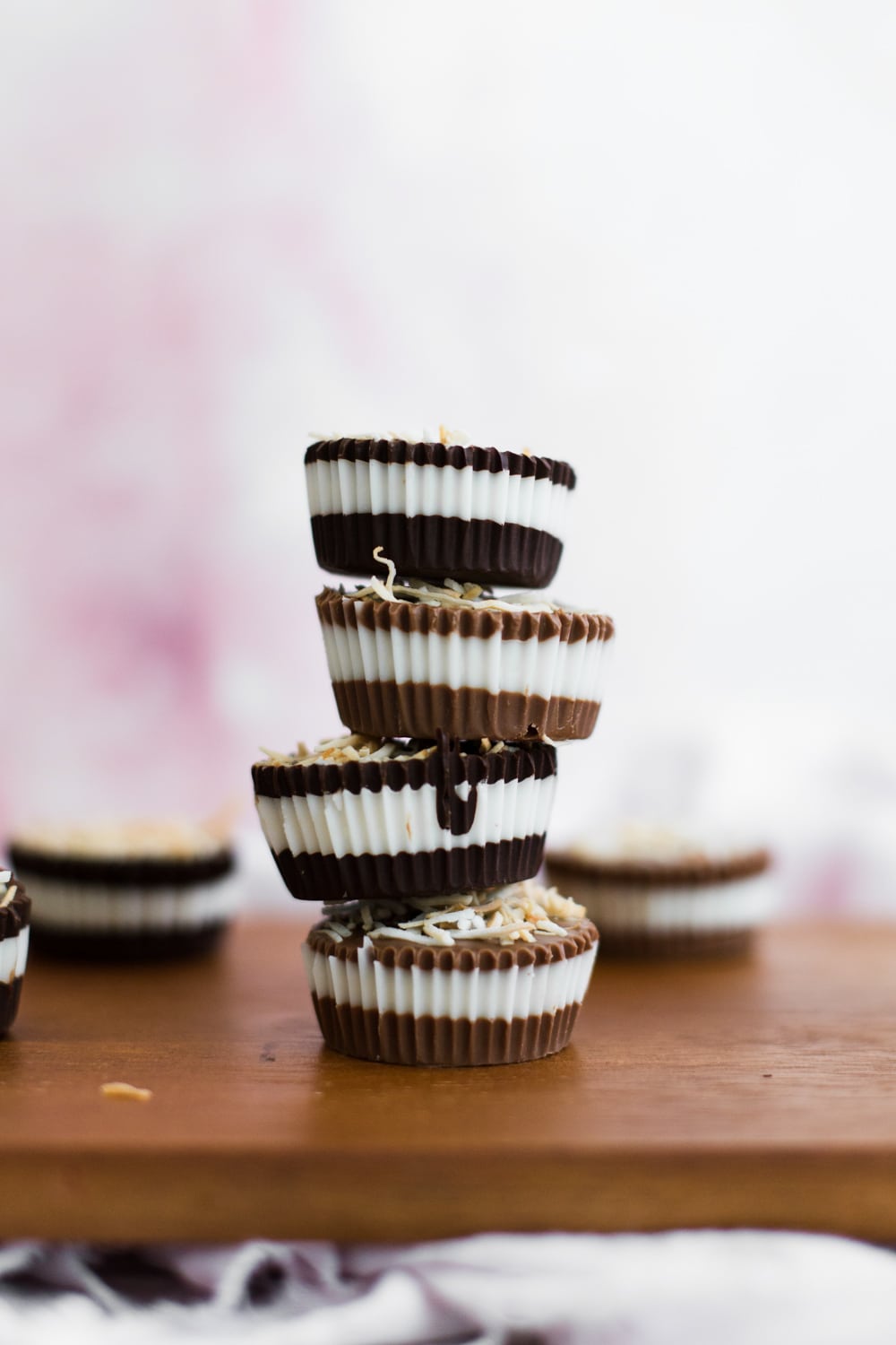 These 2 Ingredient Chocolate Coconut Butter Cups filled with homemade Coconut Butter are an amazing alternative to the regular Peanut Butter Cup! #vegan #coconut #peanutbuttercup #chocolate #simple #easy #nobake #dessert #kids #healthy