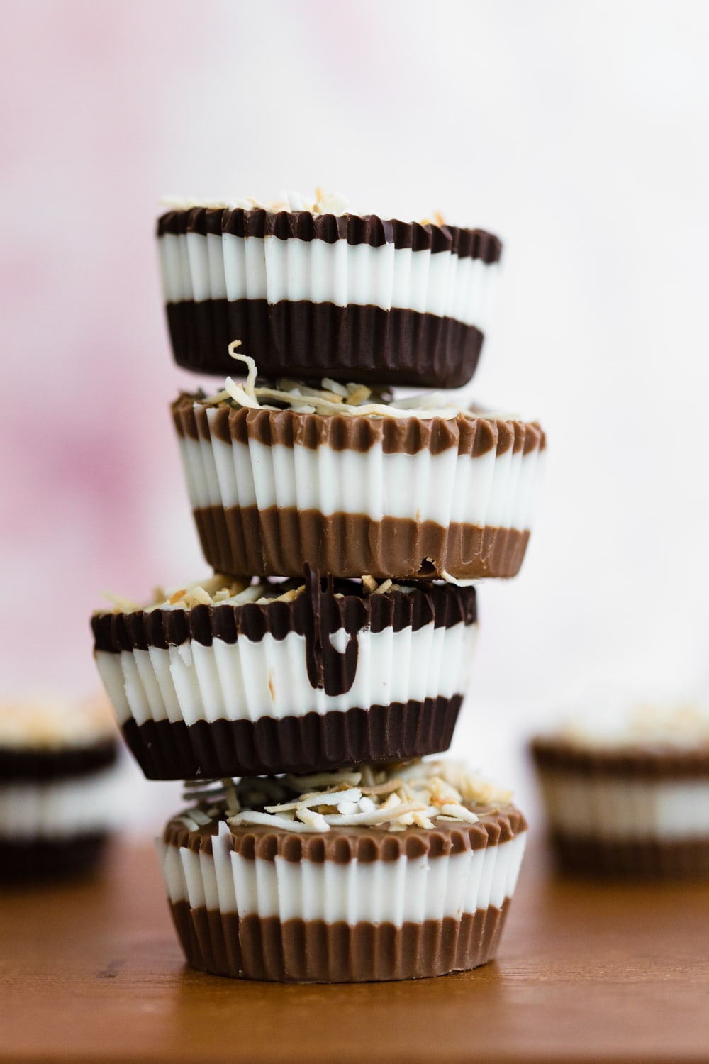 These 2 Ingredient Chocolate Coconut Butter Cups filled with homemade Coconut Butter are an amazing alternative to the regular Peanut Butter Cup! #vegan #coconut #peanutbuttercup #chocolate #simple #easy #nobake #dessert #kids #healthy