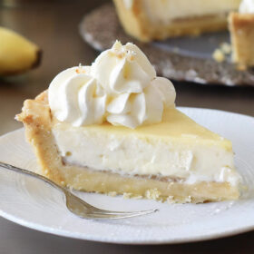 slice of banana cream pie on plate.